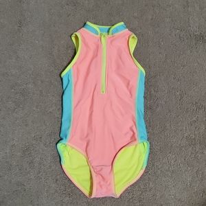 Bright colored one peice girls swim suit.